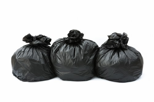 Professional waste removal team at a business site in Harrow